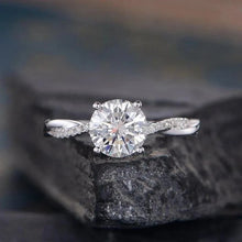 Moissanite wrapped solitaire
