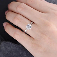 Moissanite wrapped solitaire