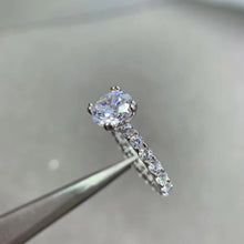 ROUND MOISSONITE RULL STONE BAND SOLITAIRE